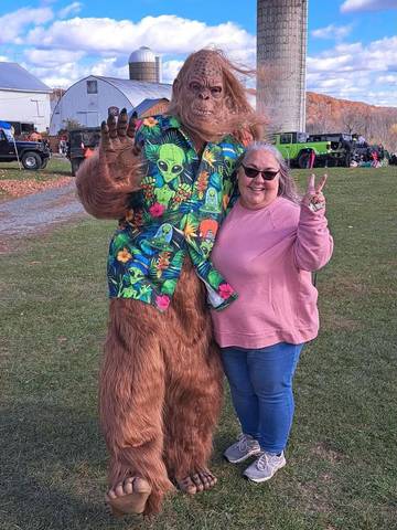 Kimm with Bigfoot at the trunk-or-treat